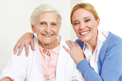 two woman smilling