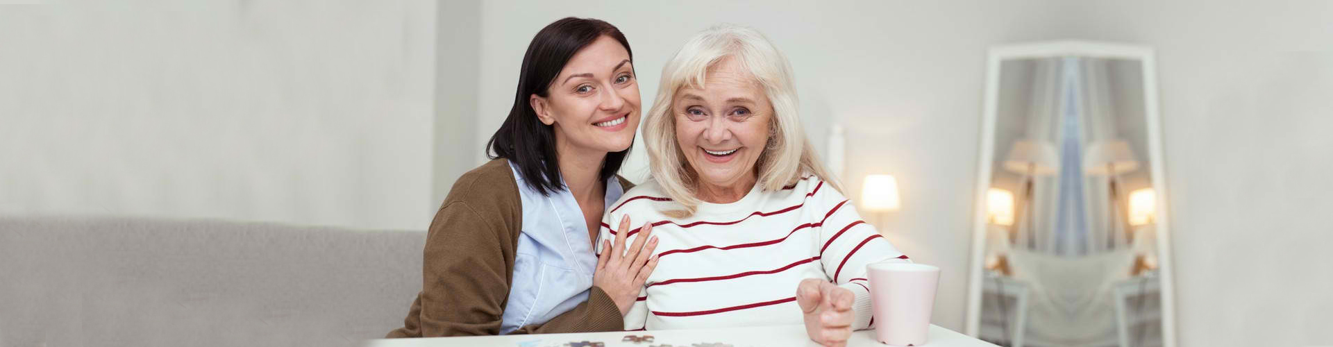 two woman smilling