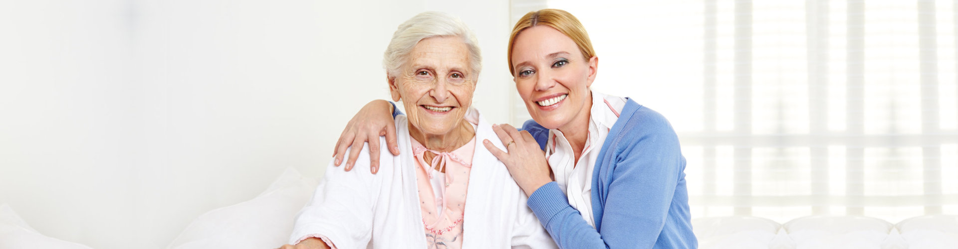 two woman smilling